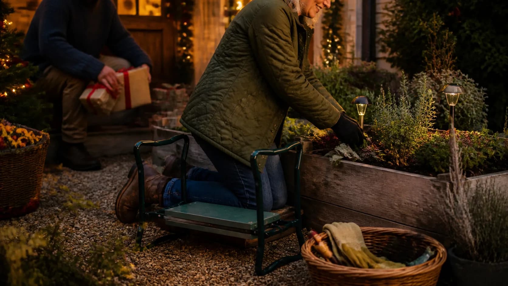 Representative folding garden kneeler bench beside raised flower beds