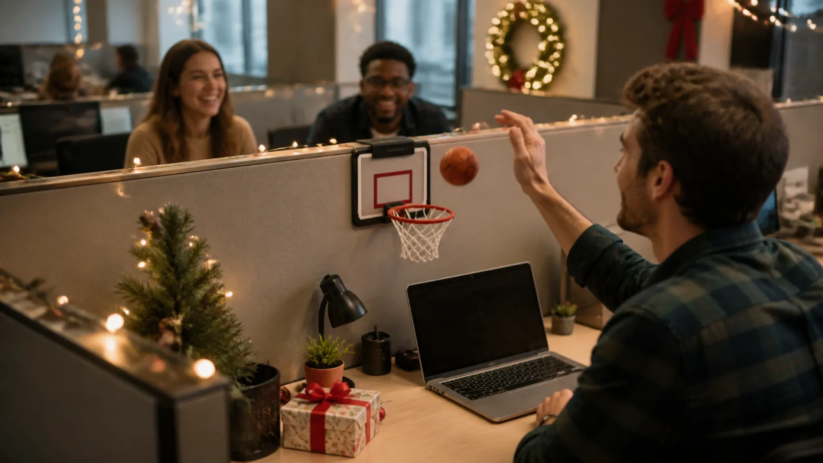 Representative miniature basketball hoop mounted at the edge of an office desk