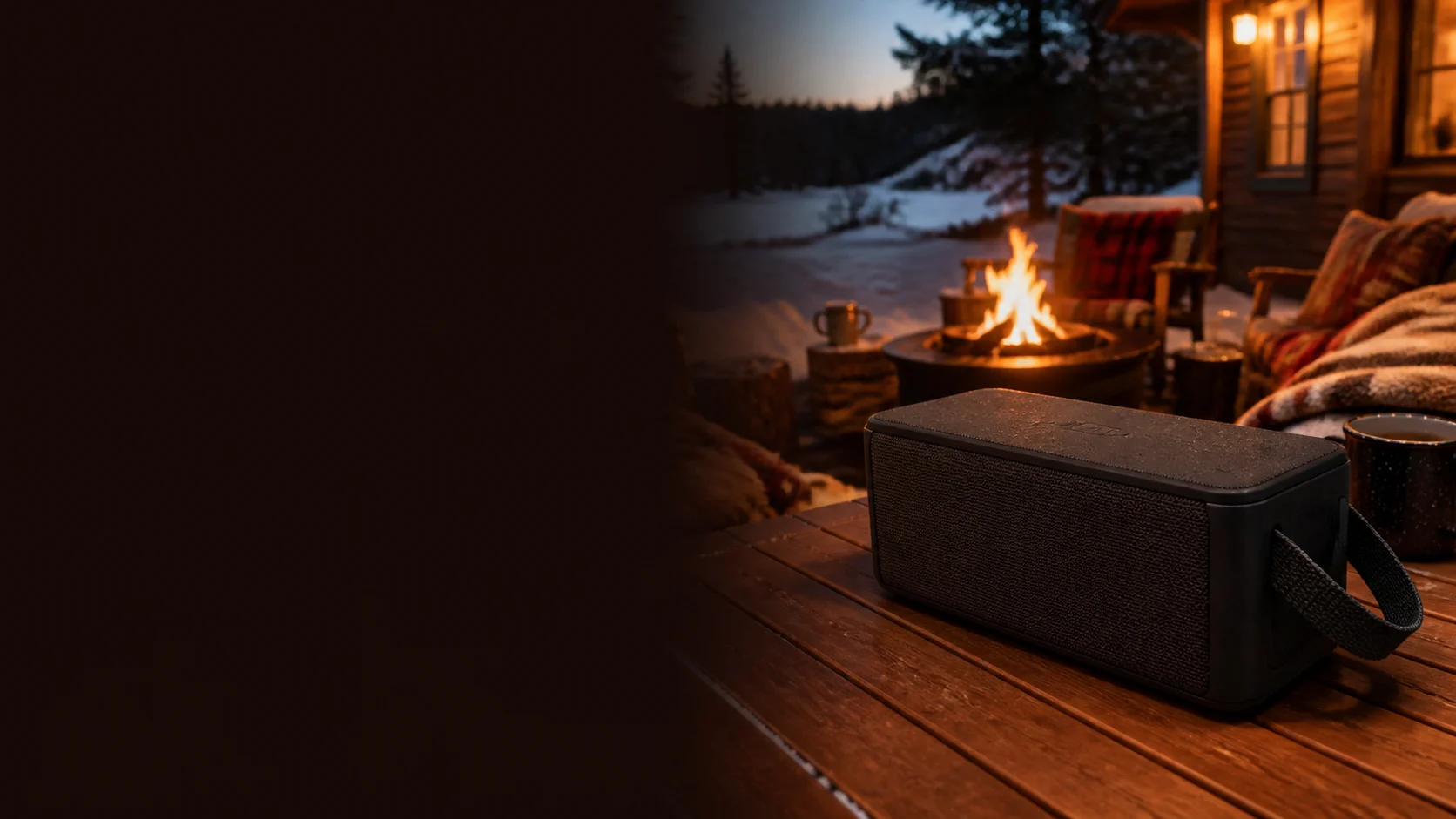Representative rugged portable speaker beside a winter cabin firepit